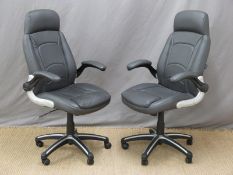 Two modern office chairs with adjustable height and arm rests
