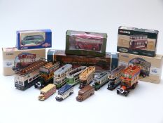 Sixteen Corgi diecast model buses, trams and coaches,