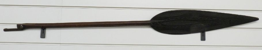 A 19thC Polynesian paddle with geometric carved decoration,
