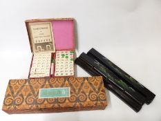 A bone and bamboo Mahjong set with painted lacquer stands