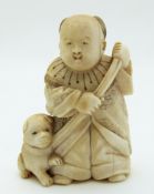 Japanese Meiji period netsuke of a boy with dog