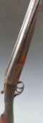 English 20 bore side by side shotgun with engraved lock, chequered grip and forend,