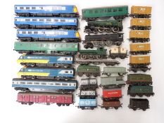 Forty-four Hornby and other 00 gauge model railway locomotives and rolling stock including Midland