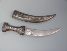 Jambiya dagger with decorated blade and decorated metal covered leather scabbard,