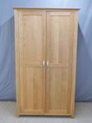 Modern light oak two door wardrobe W110 x D54 x H192cm