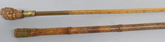 A 19th / early 20thC boxwood and brass horse measuring stick