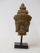 Cambodian stone carving of a Khmer head, possibly late 10thC,