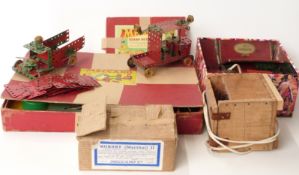 A large collection of Meccano parts together with two outfits No.