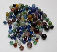 Approximately 100 glass marbles including peppermint and latticino examples,
