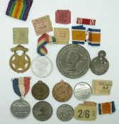 A collection of Royal Family commemorative medallions,