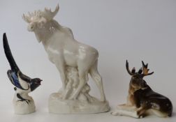 Three Lomonosov USSR figures comprising two moose,