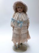 Franklin Mint bisque headed doll with painted features and fairy outfit, 65cm tall,