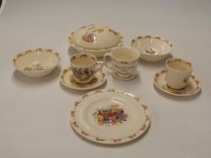 Seven pieces of Royal Doulton Bunnykins ware including a baby warming dish and cover