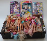 Two Sindy dolls together with approximately 40 other loose dolls of various ages to include Paul