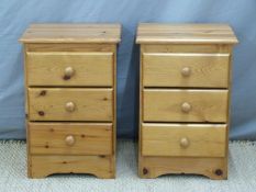 A pair of pine bedside chests,