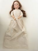 Armand Marseille bisque headed doll with open mouth, weighted blue eyes,