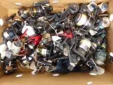 A large collection of fixed spool fishing reels including Shakespeare, Okuma, Jarvis Walker,