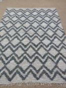 An unused Berber leather rug 170 x 240cm
