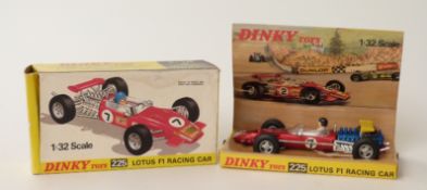 Dinky Toys diecast model Lotus F1 Racing Car with metallic red body, blue engine,