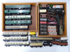 Thirty-four Hornby, Tri-ang and similar 00 gauge coaches,