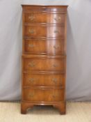Small bow fronted chest on chest of six graduated drawers,
