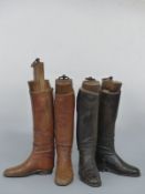 Two pairs of riding boots with trees
