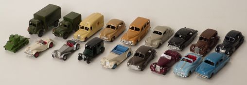 Eighteen Dinky Toys diecast model vehicles including a tank, military vehicles, Daimler ambulance,