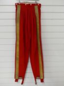 A c1820 16th Lancers officer's full dress coveralls of scarlet cloth with wide gold braid stripe to