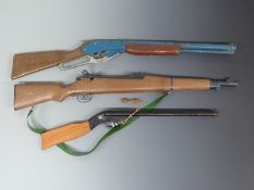 Three child's guns comprising a British made American Winchester style underlever air rifle,