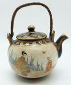 Japanese Satsuma miniature teapot with figural decoration and seal mark to base, 5.