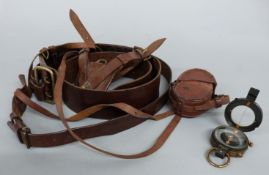 A leather Sam Brown style belt and a military marching compass by F Darton & Co,