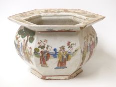 An 18th / 19thC enamelled octagonal Chinese jardiniere, each side decorated with figures,