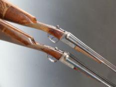 Composed pair of AYA 12 bore side by side ejector shotguns with named and engraved locks,