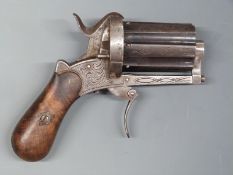 Unnamed 9mm six-shot pinfire hammer action pepperbox revolver with engraved frame,