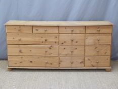 Pine chest of 13 variously sized drawers W171 x D40 x H78cm