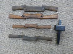 Four wooden spoke shaving tools and an ebony and brass cutting gauge stamped Randall CC