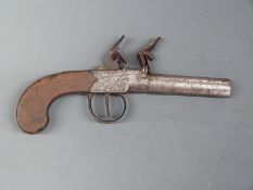 Unnamed flintlock hammer action pistol with engraved lock and trigger guard,
