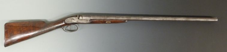 Unnamed 18 bore muzzle loading side by side gun with engraved locks, butt plate,