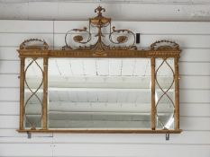 Georgian or Regency gilded mirror with ornate swags and urn finial 94 x 118cm overall
