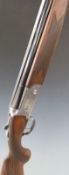 Lincoln 12 bore over and under ejector shotgun with engraved locks,