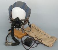 Post WWII RAF blue flying helmet with oxygen mask and transformer in bag named S/LDR R J W Motley