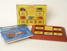 Two Matchbox Originals 1-75 series diecast model vehicle sets in original display boxes,