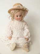 Armand Marseille bisque-headed doll with open mouth, weighted brown eyes,
