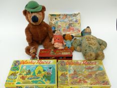 A collection of children's TV related items including Sooty and Sweep,