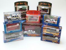 Twelve Corgi diecast moel vehicles including Eddie Stobart, Royal Mail, police cars,