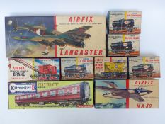 Nine Airfix and Kitmaster 00 gauge kits comprising mainly railway wagons and coaches,