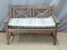 A teak garden bench,