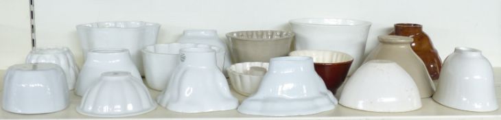 A collection of 17 jelly moulds including one by Shelley in the form of an armadillo.