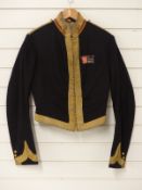 Victorian c1860 3rd (King's Own) Light Dragoons officer's stable jacket of black cloth with red