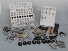 A large collection of police insignia, badges, buttons, shoulder titles,